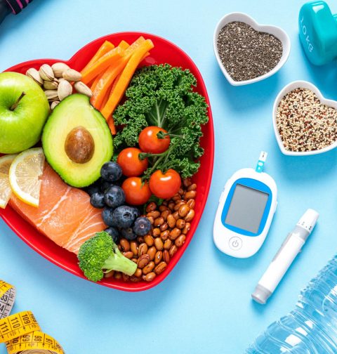 Person experiencing symptoms that may be associated with blood sugar imbalance