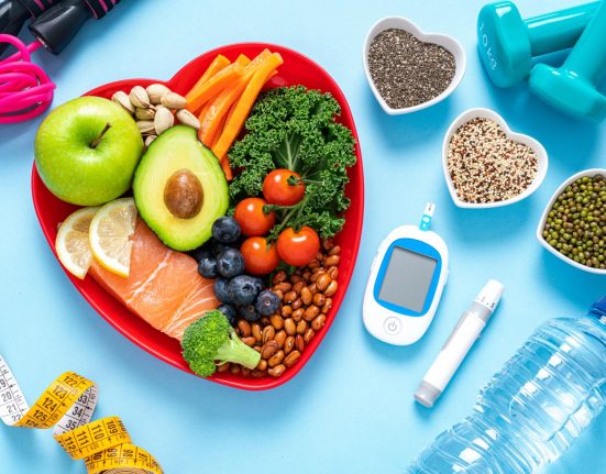 Person experiencing symptoms that may be associated with blood sugar imbalance