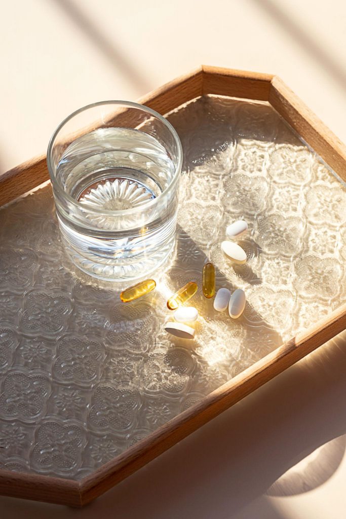 A clean wellness-themed image representing supportive supplementation as part of a balanced morning routine focused on stable energy and blood sugar health.