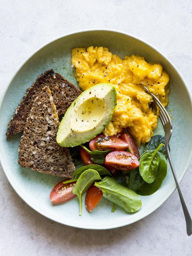 A nutritious breakfast setup featuring protein-rich foods that help reduce blood sugar spikes and support sustained energy throughout the morning.