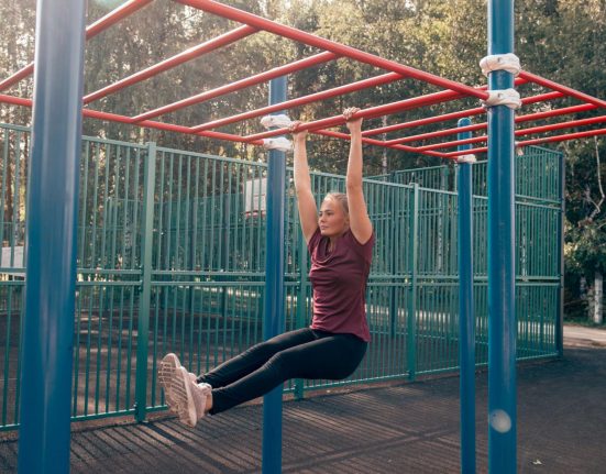 People exercising outdoors to improve physical fitness, mental health, and overall well-being